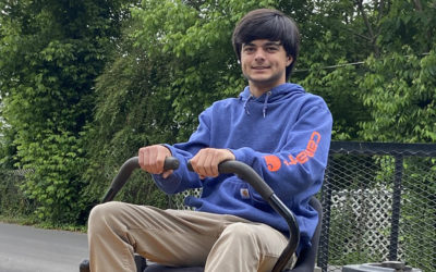2020 Rogers Scholar Ben Tallent provides free lawn-mowing service