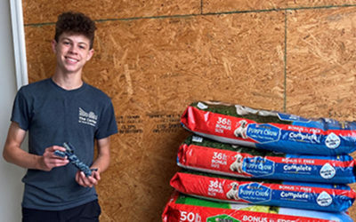 2020 Rogers Scholar Aaron Hesse donates 450 lbs. of dog food to animal shelter