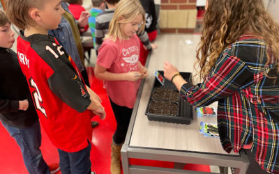 2021 Rogers Scholar Mary Hope Jackson helps students plant a garden