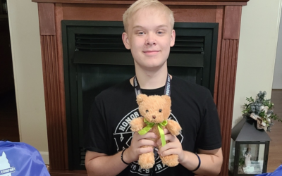 2022 Rogers Scholar Todd Prater donates Teddy Bears to law enforcement officers